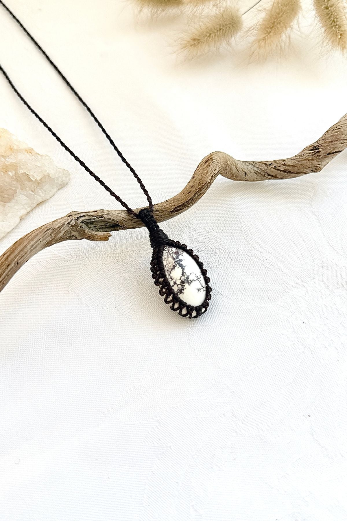 Handmade Wild Horse Magnesite macramé necklace, side view showing the gemstone and macramé knotting