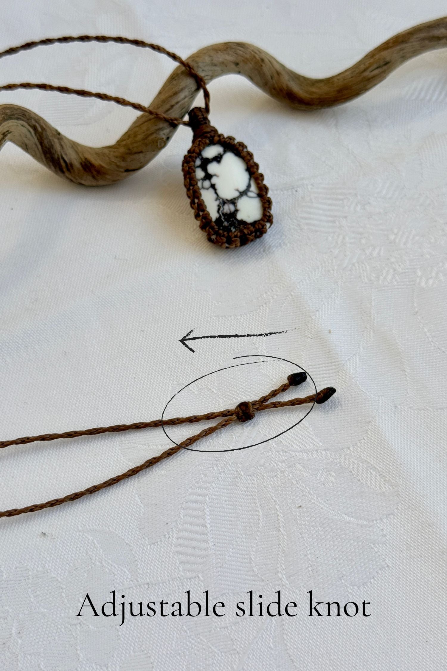 Close-up of the adjustable sliding knot on the Wild Horse Magnesite Macrame necklace, allowing for an easy and customizable fit for any wearer.