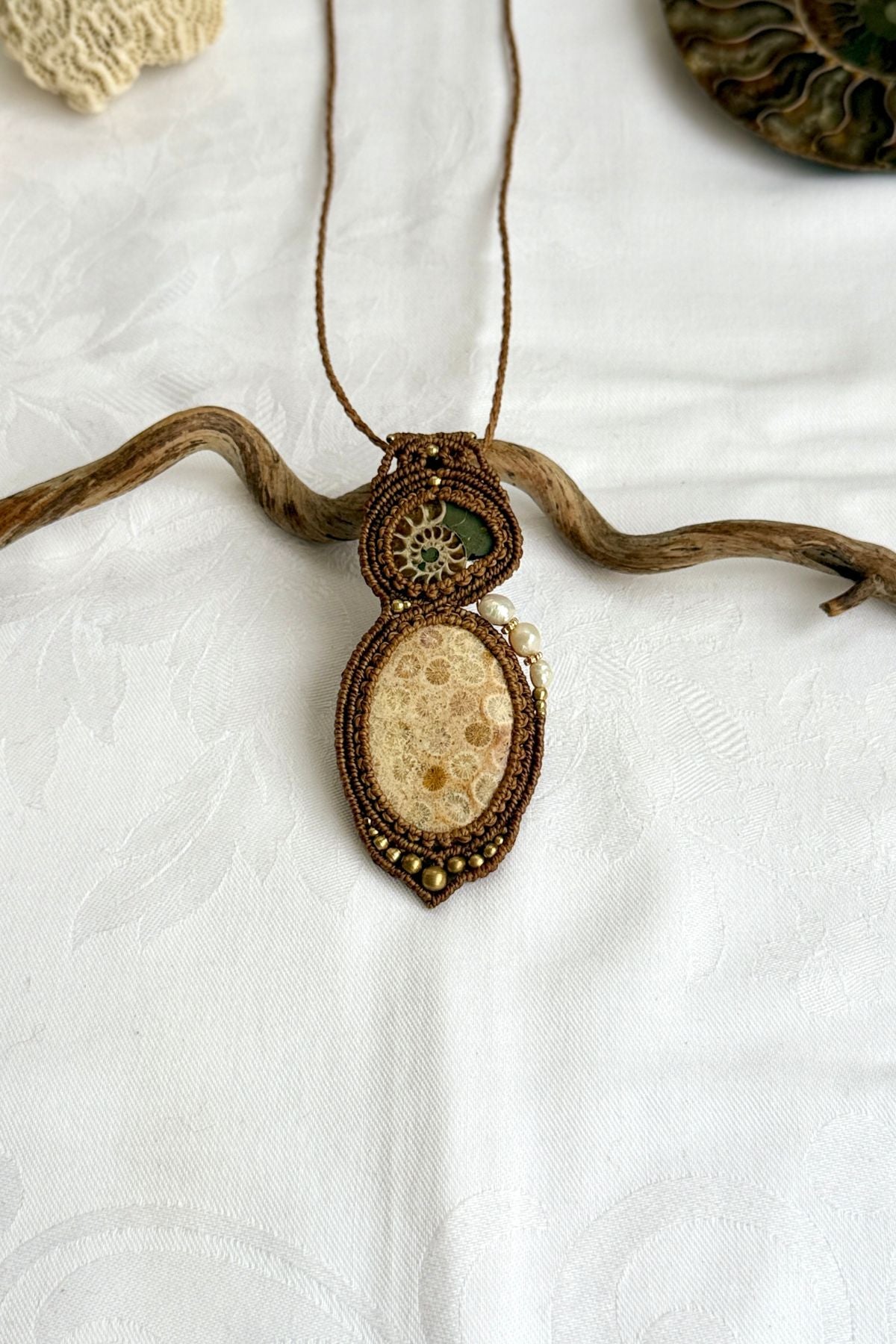 One of a kind ammonite fossil and coral necklace with pearls, bold ocean inspired statement piece.