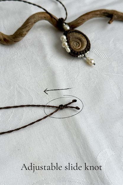 Adjustable slide knot closure on handmade ammonite fossil statement necklace