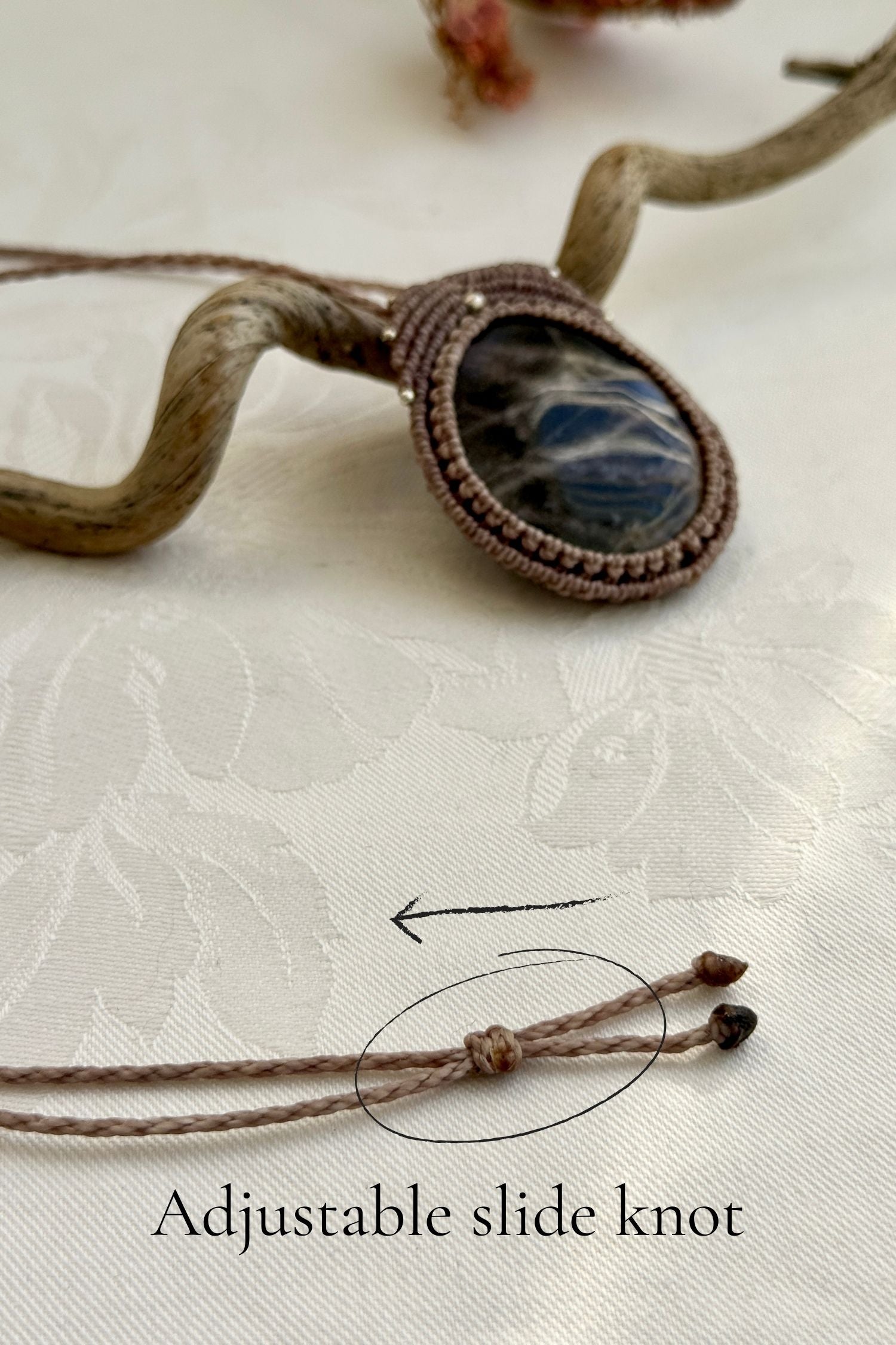 Adjustable handmade macrame necklace with Black Moonstone. Featuring a sliding knot closure for a customizable fit.