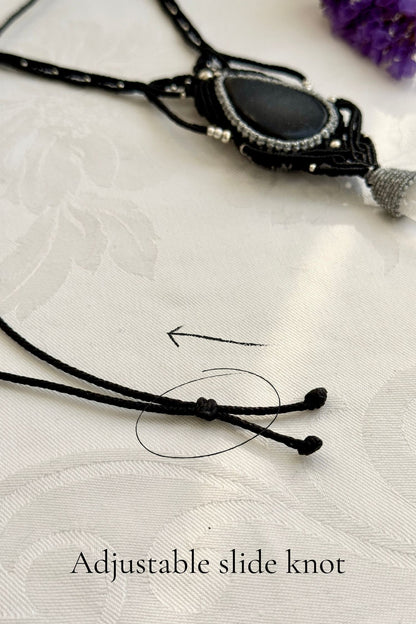 Adjustable handmade macrame necklace with Druzy Onyx and Clear Quartz point. Featuring a sliding knot closure for a customizable fit.