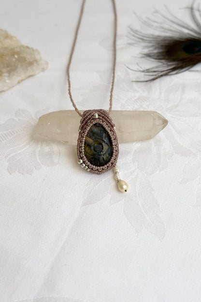 Handmade macrame necklace with Labradorite protective eye pendant, displayed flat to reveal the fresh Water Pearl accents.