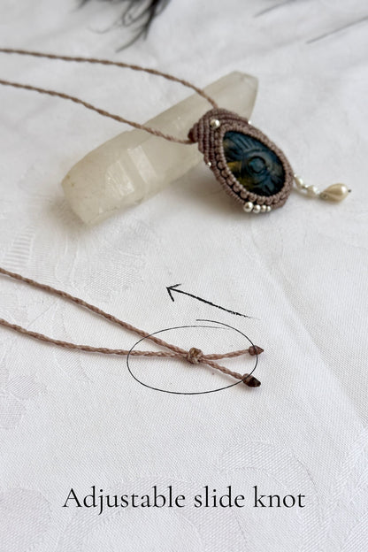 Adjustable sliding knot closure on handmade Labradorite necklace, showing versatile and comfortable fit.