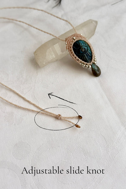 Adjustable sliding knot closure on handmade Labradorite necklace, showing versatile and comfortable fit.