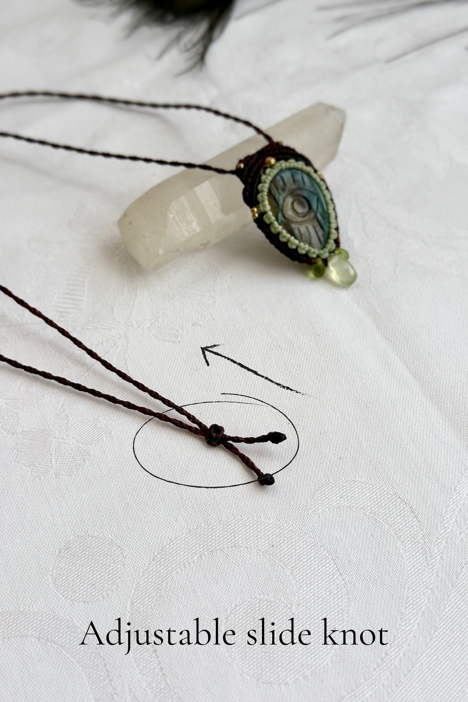 Adjustable sliding knot closure on handmade Labradorite necklace, showing versatile and comfortable fit.
