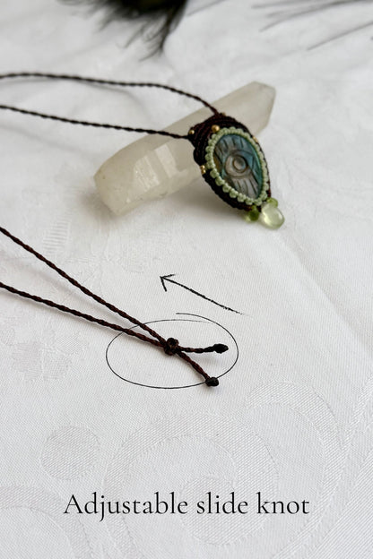 Adjustable sliding knot closure on handmade Labradorite necklace, showing versatile and comfortable fit.