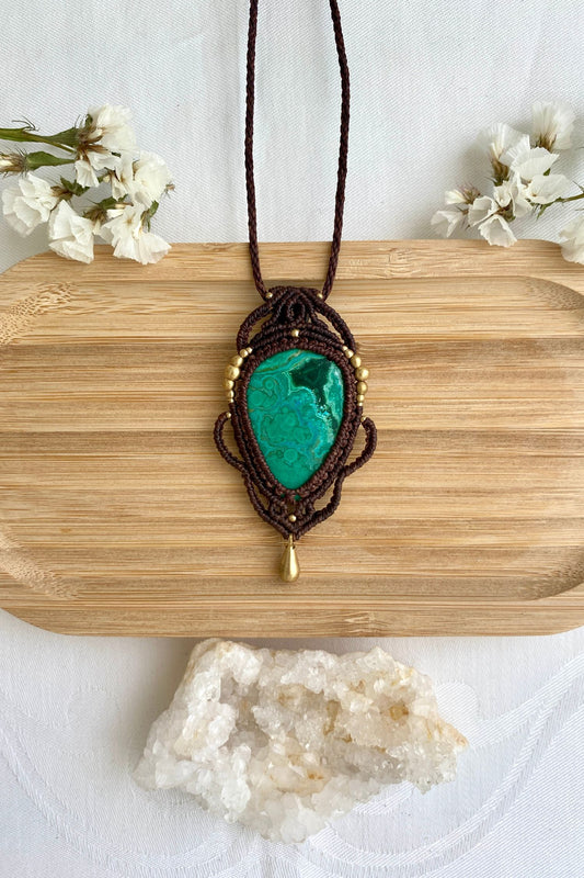 Handmade macrame necklace featuring a Malachite with Chrysocolla gemstone, crafted with a unique and artistic design, offering an adjustable length for a perfect fit.