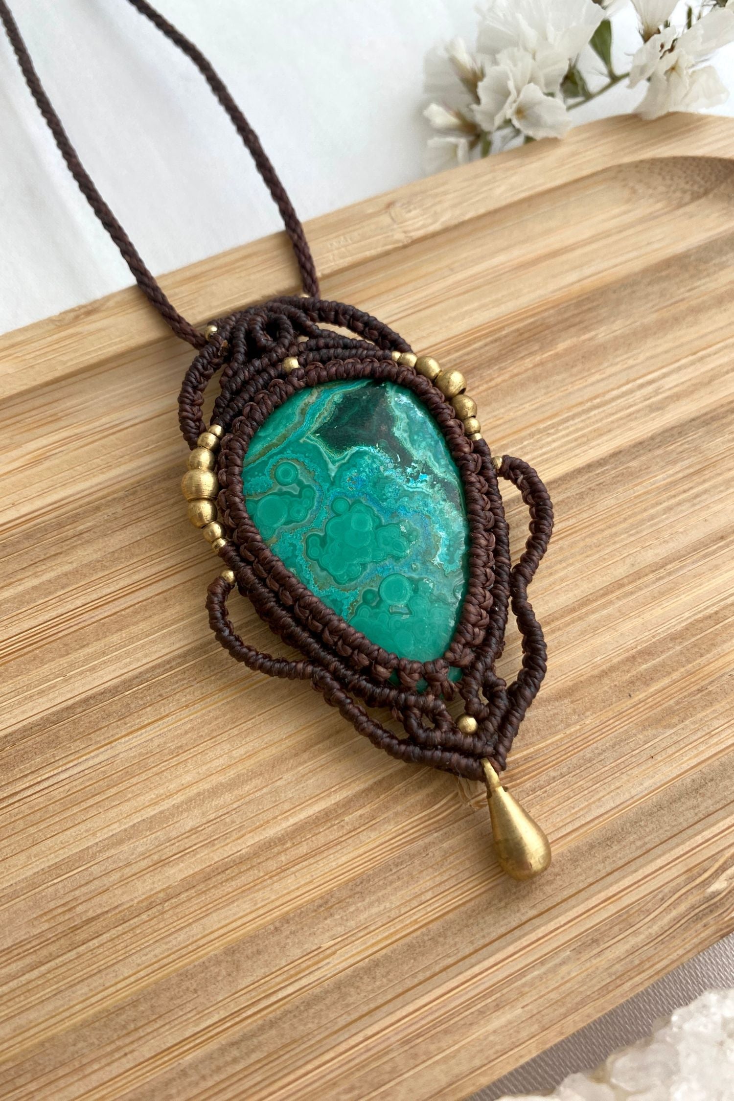 Detailed view of the handmade necklace, highlighting the raw textures of natural Malachite with Chrysocolla gemstone in a distinctive, statement-making design.