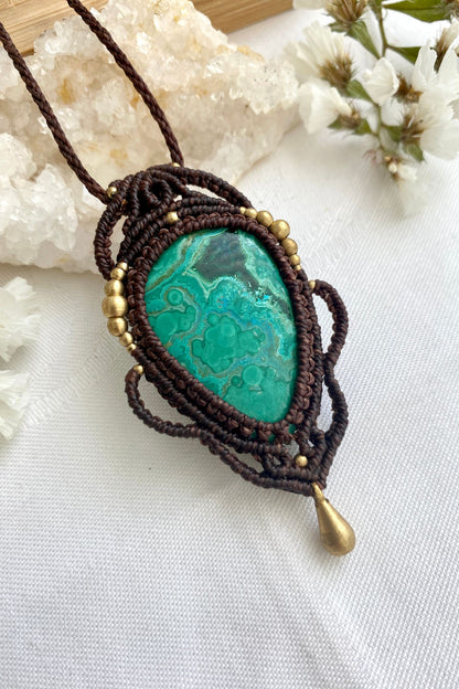 Side angle of the handcrafted macrame necklace, highlighting the detailed craftsmanship and the rich colors of Malachite with Chrysocolla gemstone.