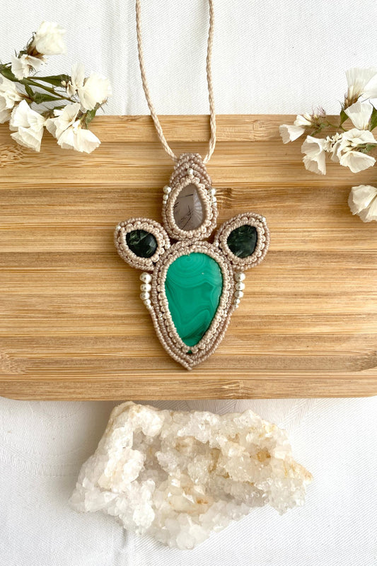 Handmade macrame necklace featuring Malachite, Seraphinite and Tourmaline Quartz gemstones, crafted with a unique and artistic design, offering an adjustable length for a perfect fit.