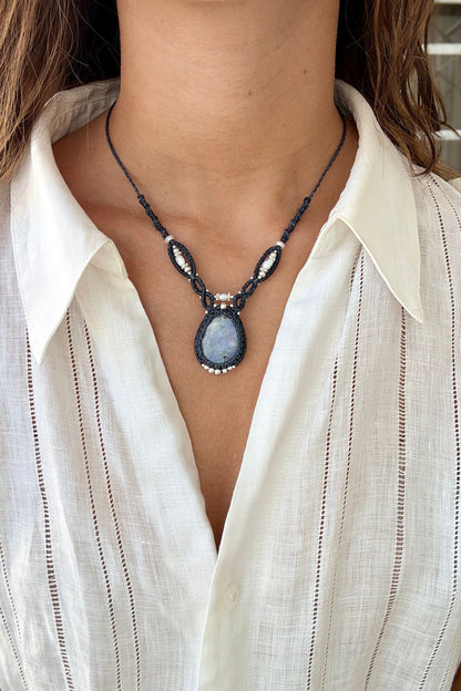 Model wearing a V-shaped Moonstone macrame statement necklace with Freshwater Pearl accents