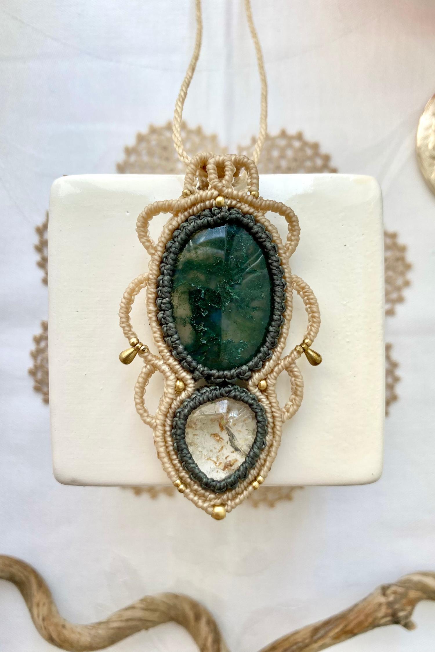 Detailed view of the handmade necklace, highlighting the raw textures of natural Moss Agate and Lodolite gemstones in a distinctive, statement-making design.