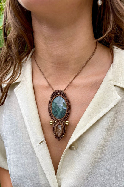 Handmade gemstone necklace worn, showing how the unique Moss Agate and Lodolite pendant elegantly rests on the neckline.