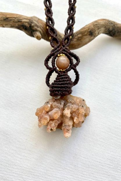 Handmade macrame necklace featuring a Raw Chalcedony and Peach Moonstone gemstones, crafted with a unique and artistic design, offering an adjustable length for a perfect fit.
