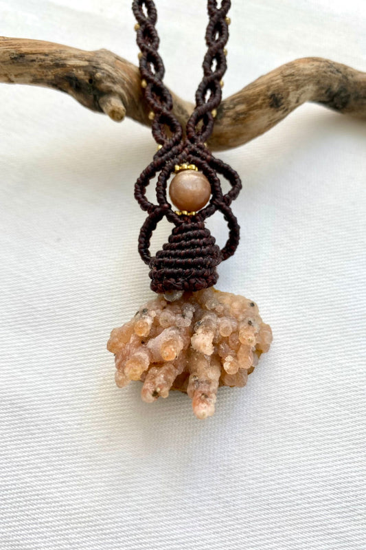 Handmade macrame necklace featuring a Raw Chalcedony and Peach Moonstone gemstones, crafted with a unique and artistic design, offering an adjustable length for a perfect fit.