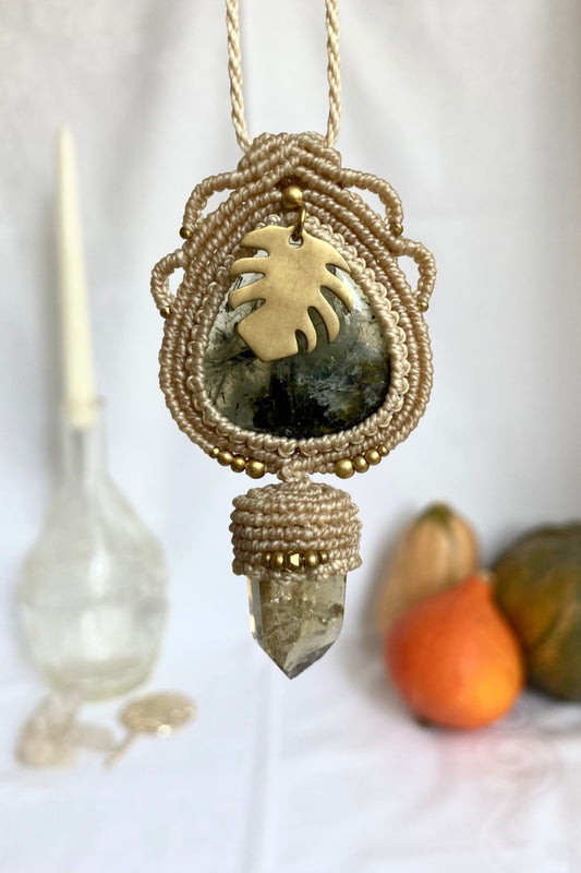 Handmade macrame necklace featuring a Prehnite and Raw Smoky Quartz Point gemstones, crafted with a unique and artistic earthy design, offering an adjustable length for a perfect fit.