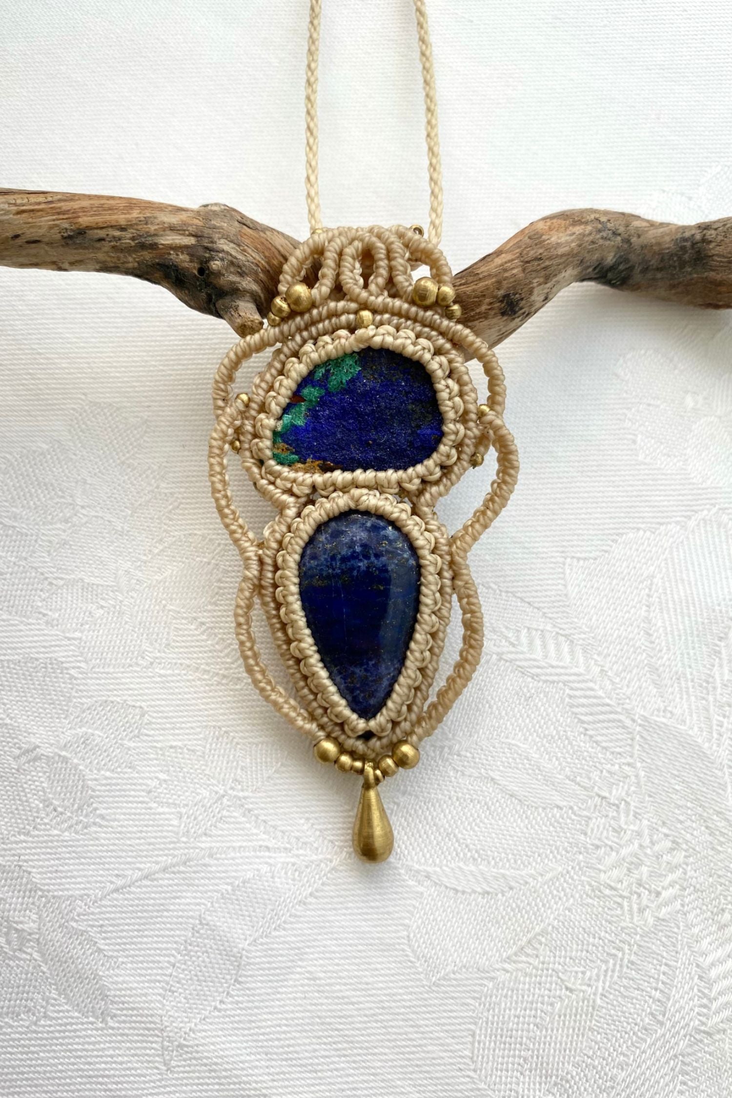 A close-up of the handmade gemstone necklace, showcasing the natural beauty of Raw Azurite and Lapis Lazuli in an exclusive, one-of-a-kind design.