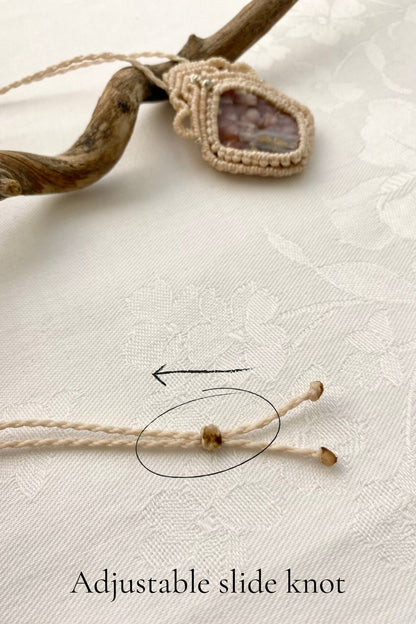 Adjustable handmade macrame necklace with a sliding knot, ensuring a customizable fit and effortless wear.