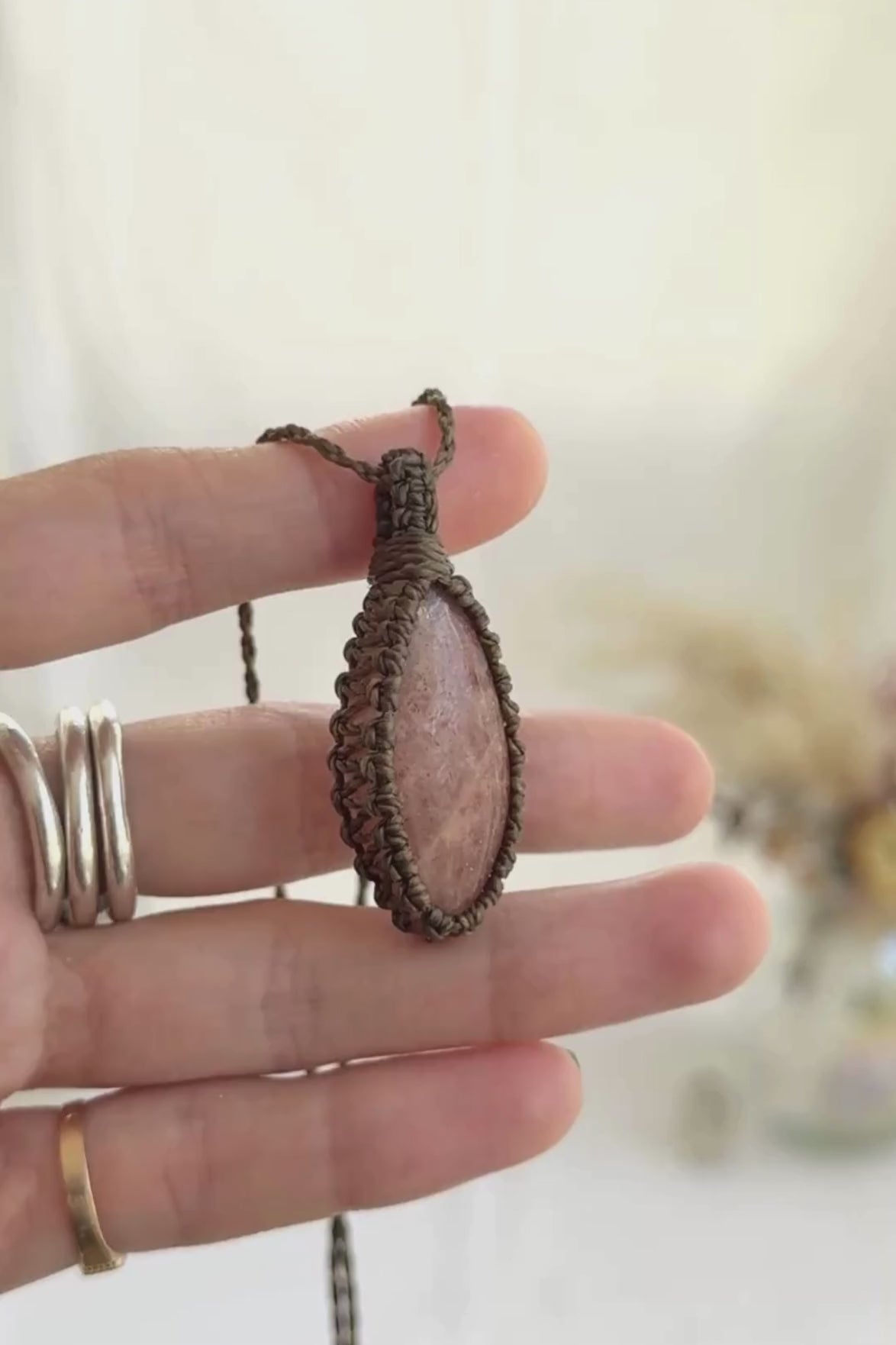 Video of the handmade Sunstone Macrame necklace, highlighting the vibrant tones of the gemstone and the lightweight, minimalist macrame design.