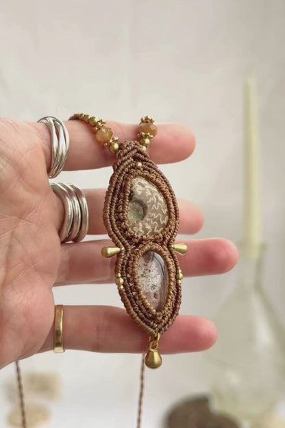 Rare ammonite and lodolite necklace showing iridescence, “landscape” inclusions, and sparkling rutilated quartz beads