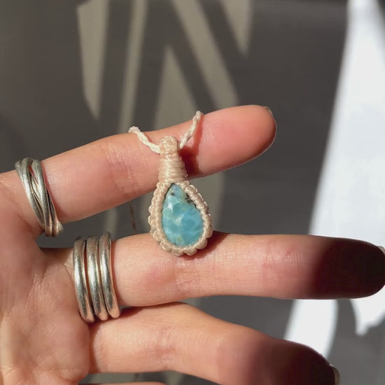 Video of the handmade Larimar Macrame necklace, highlighting the deep blue tones of the gemstone and the lightweight, minimalist macrame design.
