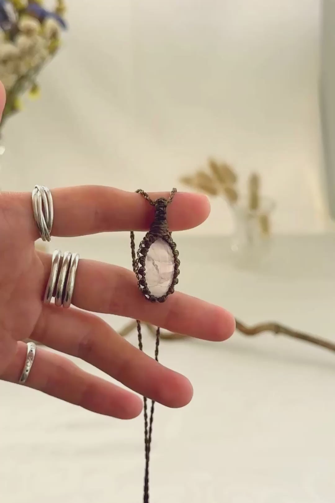 Handmade Rose Quartz macramé necklace showing natural gemstone details, texture and shine