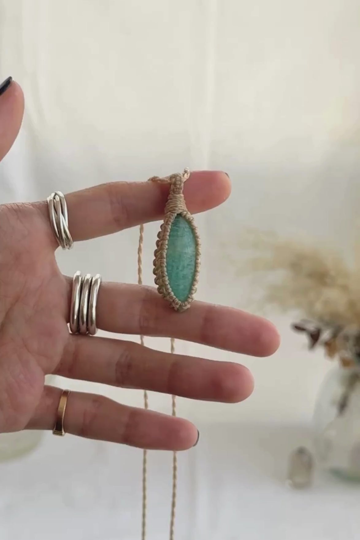 Video of the handmade Amazonite Macrame necklace, highlighting the vibrant tones of the gemstone and the lightweight, minimalist macrame design.