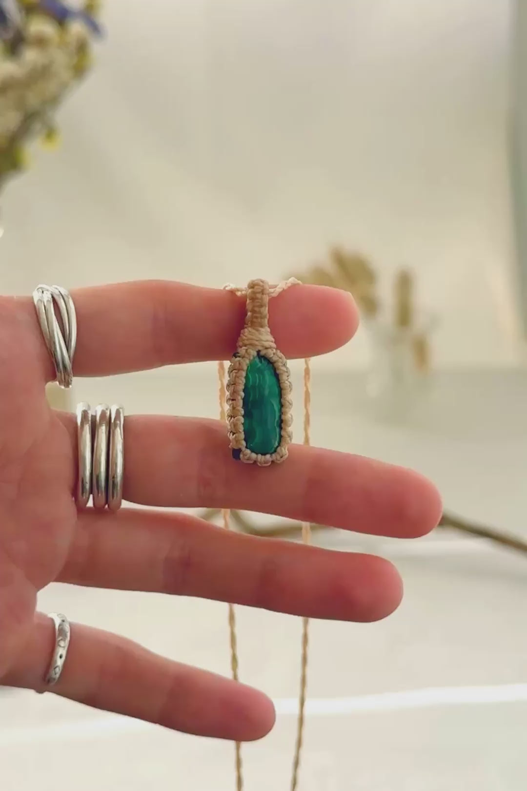 Handmade Malachite macramé necklace showing natural gemstone details, texture and shine
