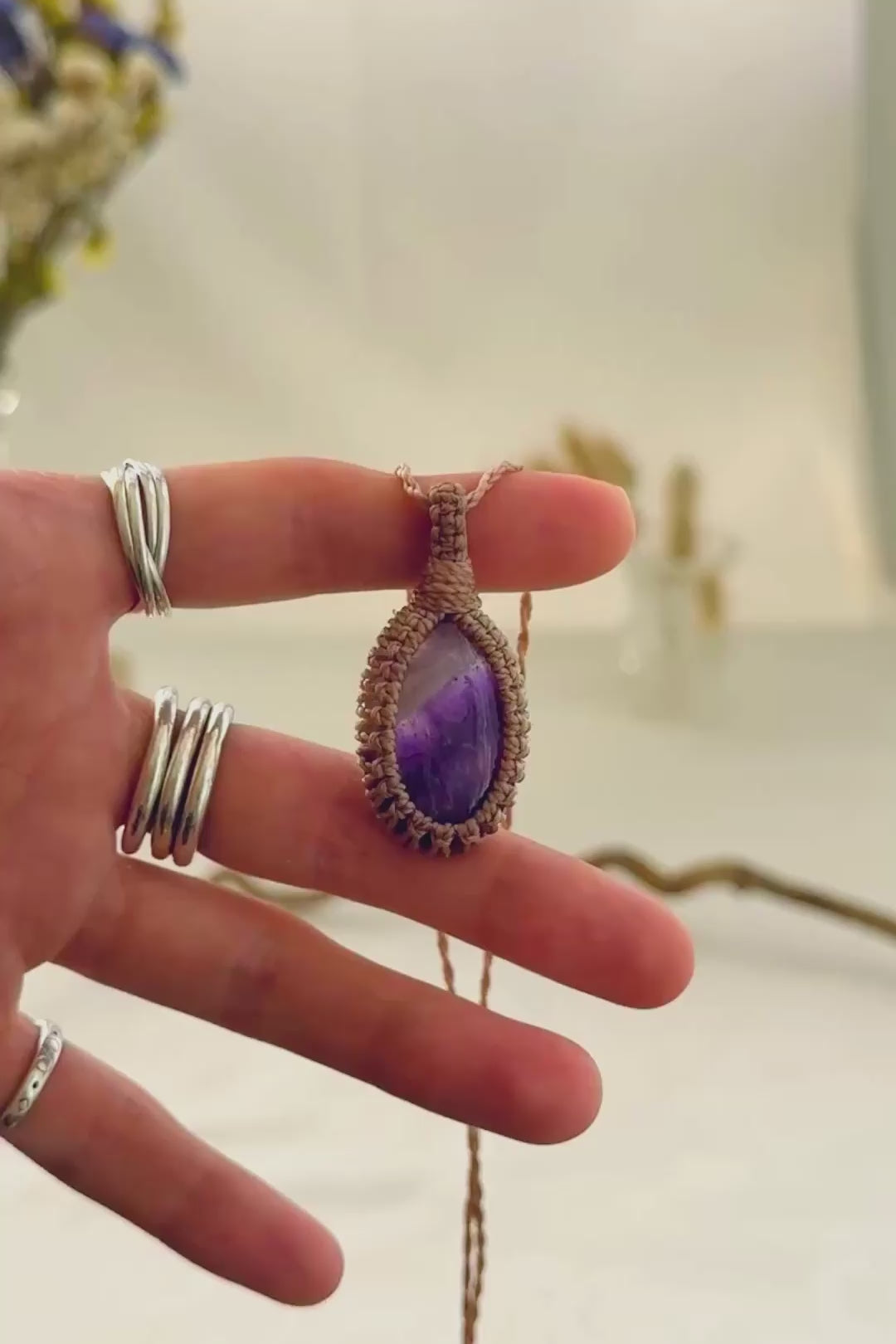 Handmade Chevron Amethyst macramé necklace showing natural gemstone details, texture and shine