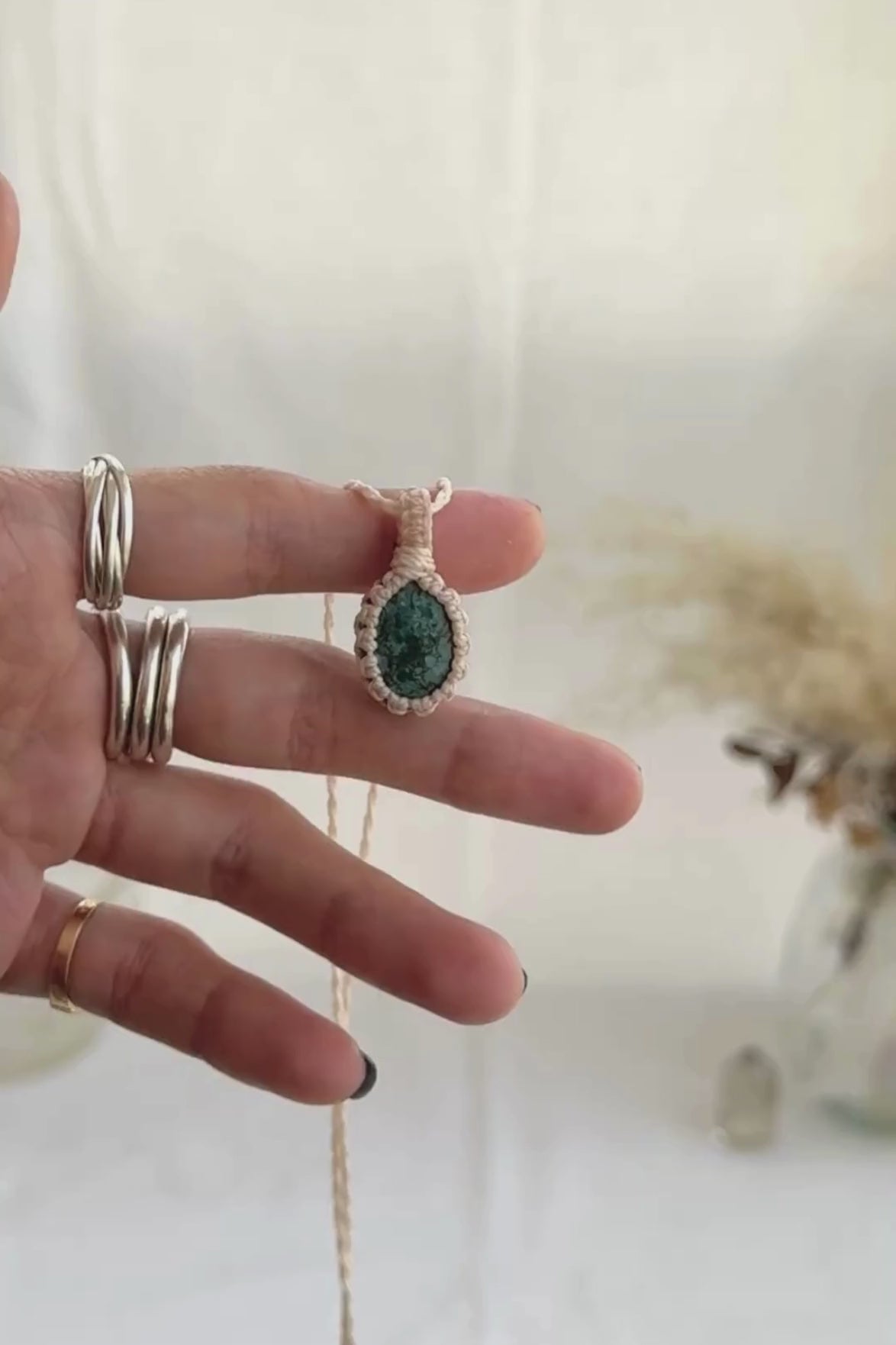 Video of the handmade Turquoise Macrame necklace, highlighting the vibrant tones of the gemstone and the lightweight, minimalist macrame design.