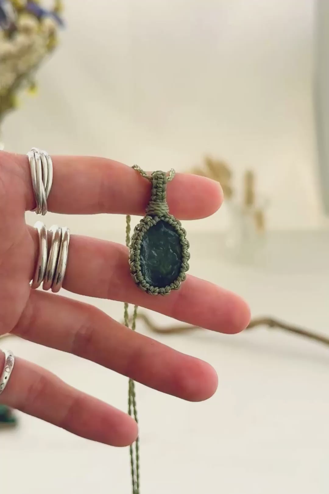 Handmade Seraphinite macramé necklace showing natural gemstone details, texture and shine