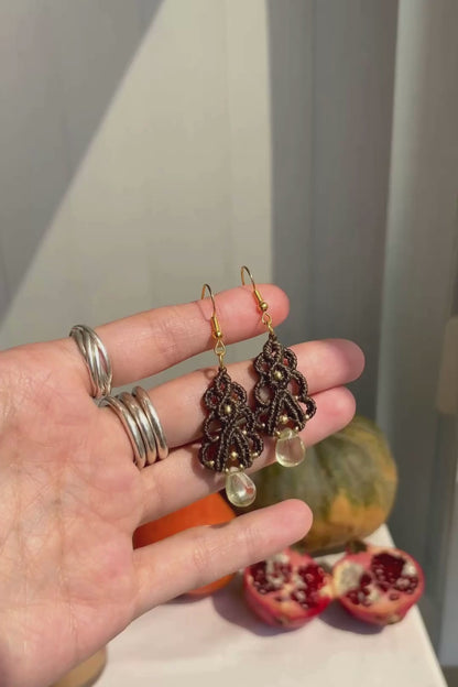Close-up video of handmade Lemon Quartz earrings, showing their lightweight movement and the sparkling effect of the natural gemstones. The stainless steel hooks add a modern and durable touch.