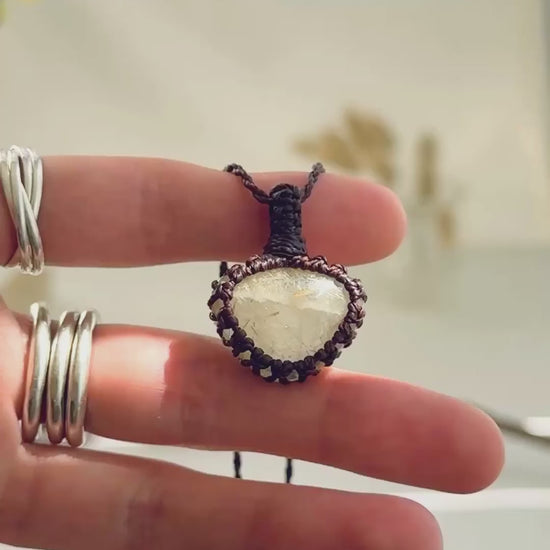Handmade Rutilated Quartz macramé necklace showing natural gemstone details, texture and shine