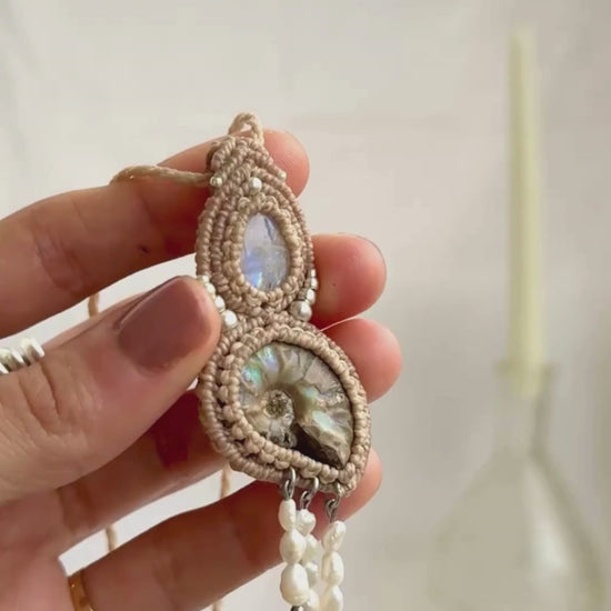 Opalized ammonite necklace showcasing iridescent shine moonstone and flowing freshwater pearl drops