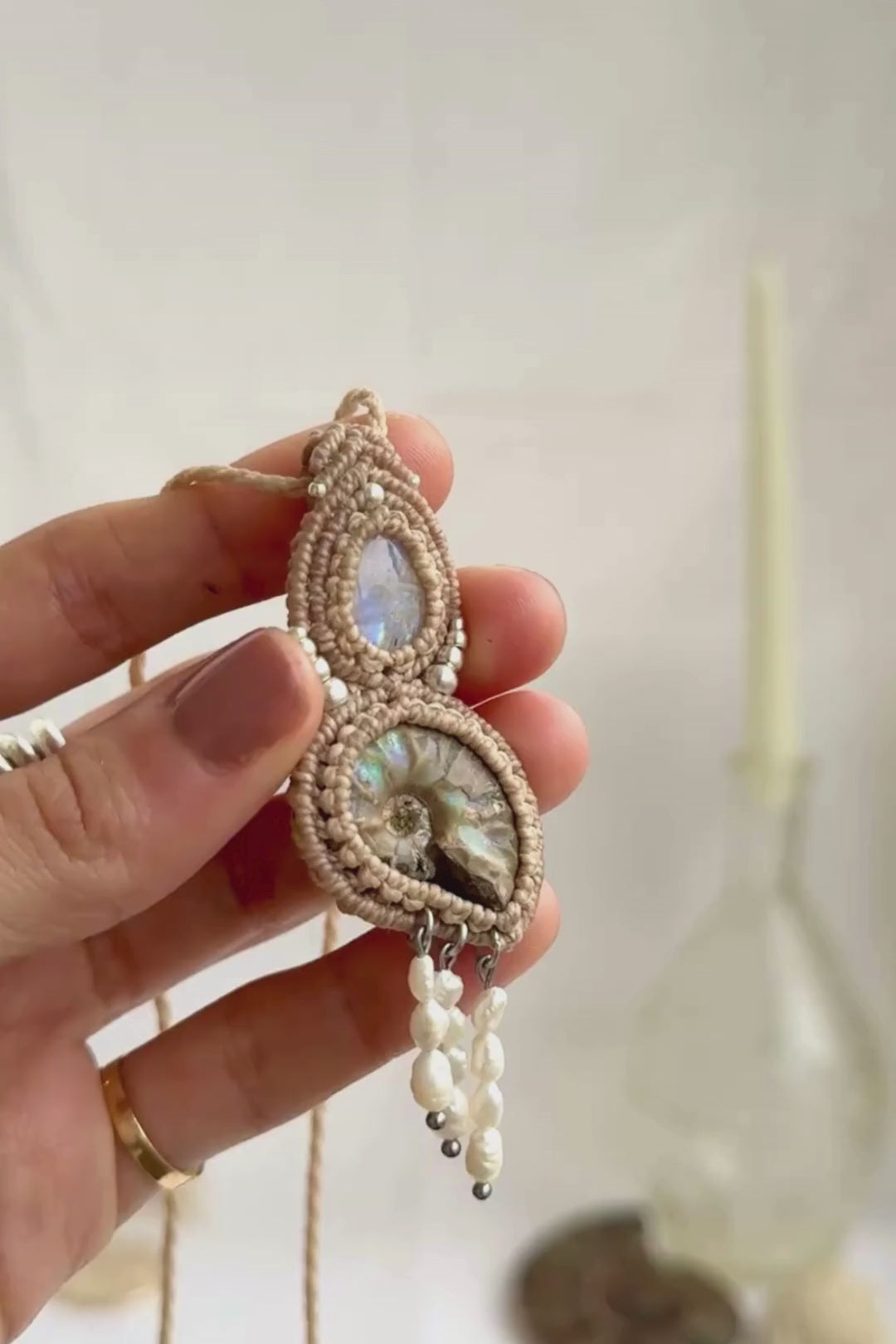 Opalized ammonite necklace showcasing iridescent shine moonstone and flowing freshwater pearl drops