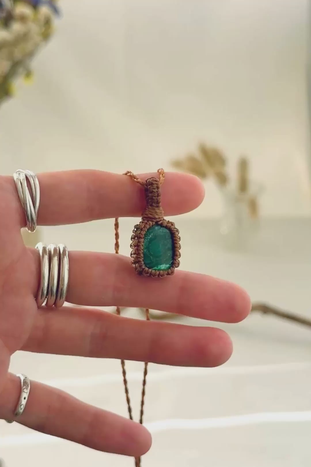 Handmade Malachite macramé necklace showing natural gemstone details, texture and shine