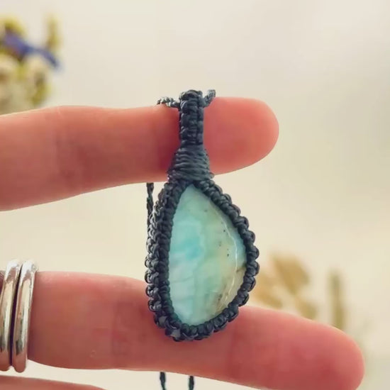 Handmade Larimar macramé necklace showing natural gemstone details, texture and shine