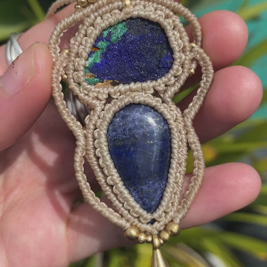 Close-up video of a handmade gemstone necklace, capturing the natural shine and intricate details of Raw Azurite and Lapis Lazuli. The unique design and polished gemstones reflect the light beautifully, highlighting the craftsmanship and one-of-a-kind artistry.