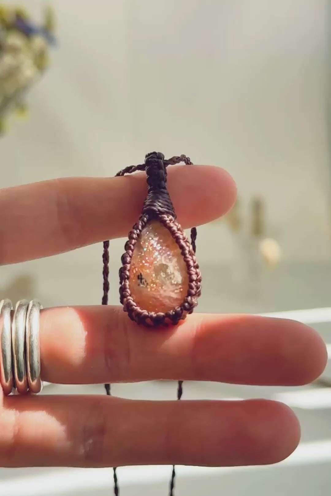 Handmade Sunstone macramé necklace showing natural gemstone details, texture and shine