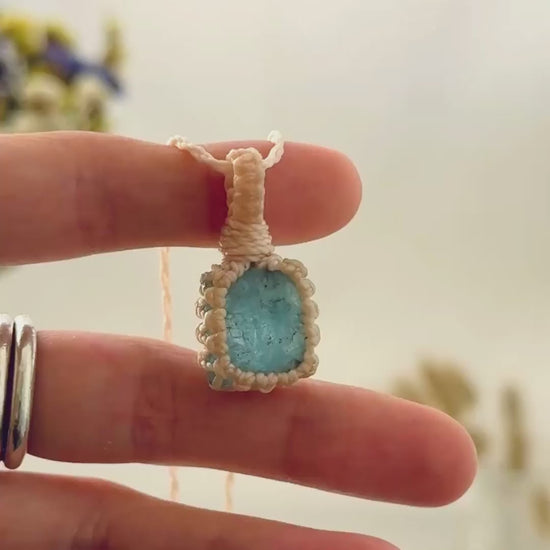 Handmade Aquamarine macramé necklace showing natural gemstone details, texture and shine