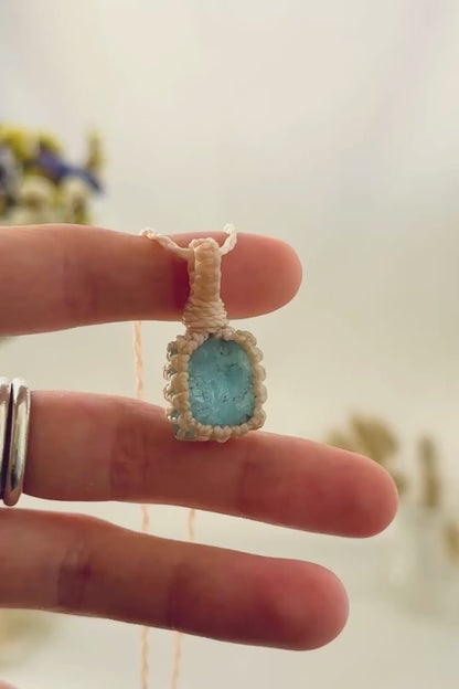 Handmade Aquamarine macramé necklace showing natural gemstone details, texture and shine