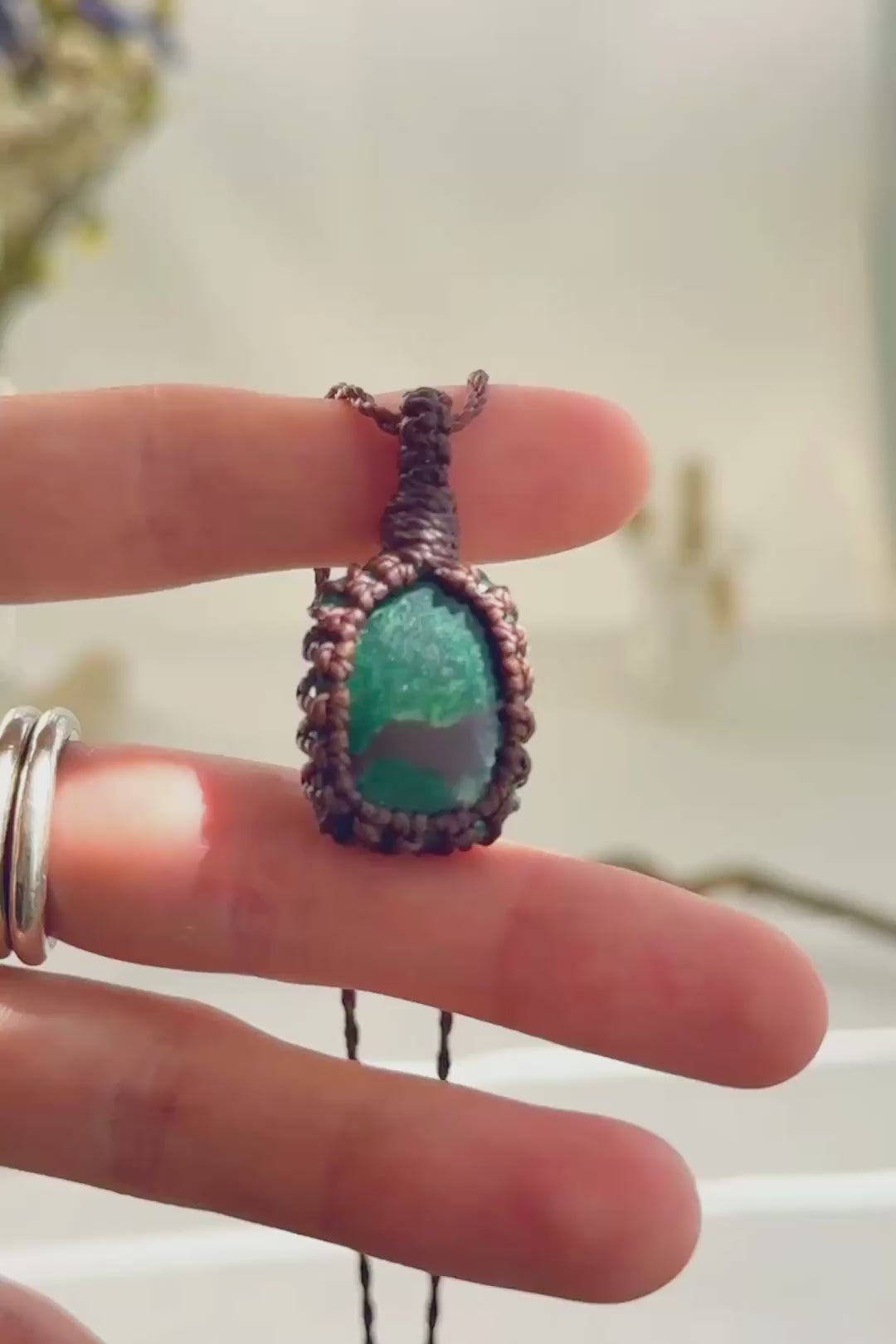 Handmade Malachite macramé necklace showing natural gemstone details, texture and shine