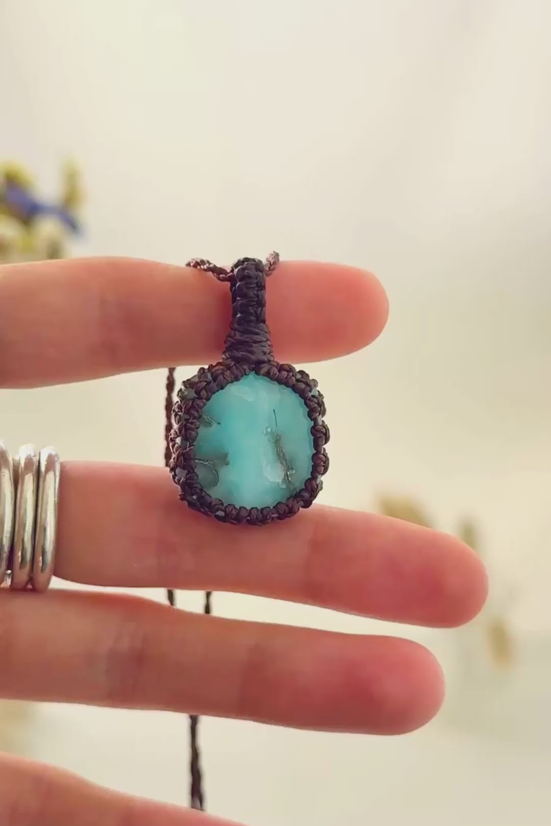 Handmade Larimar macramé necklace showing natural gemstone details, texture and shine