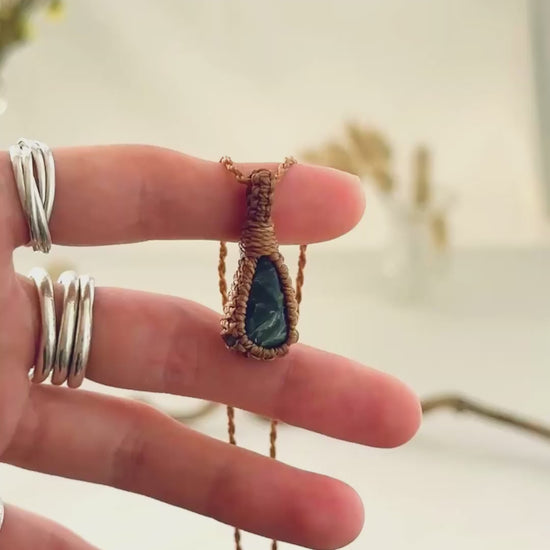 Handmade Seraphinite macramé necklace showing natural gemstone details, texture and shine
