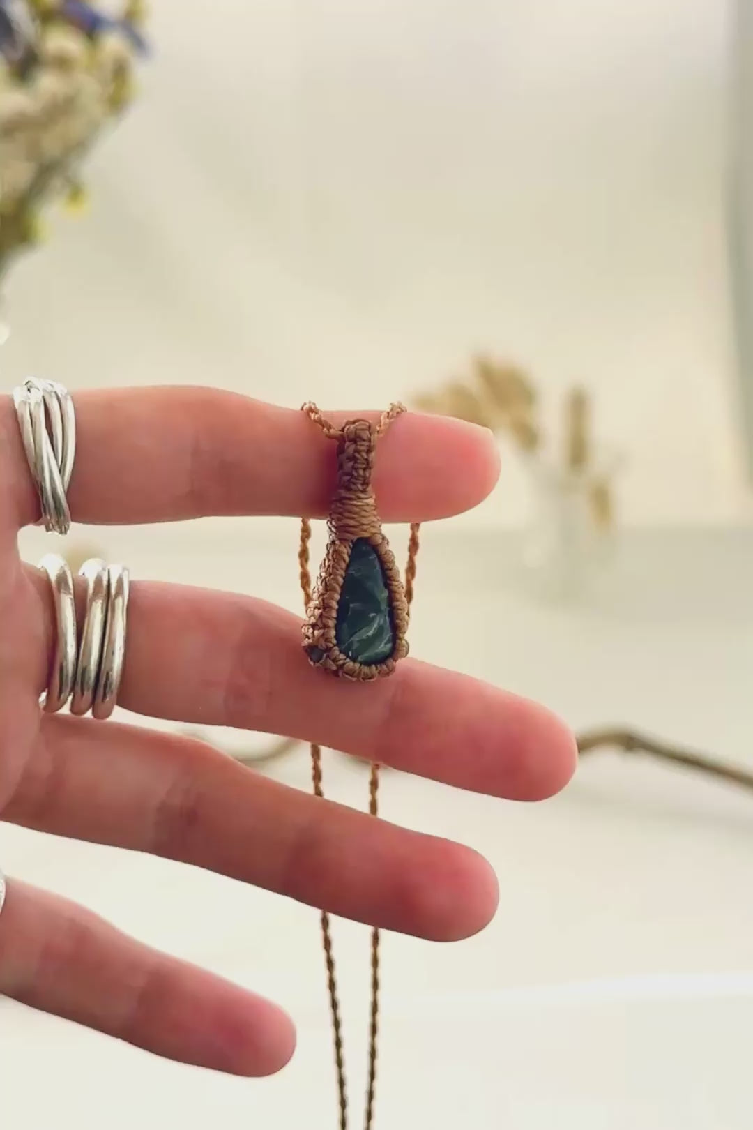 Handmade Seraphinite macramé necklace showing natural gemstone details, texture and shine
