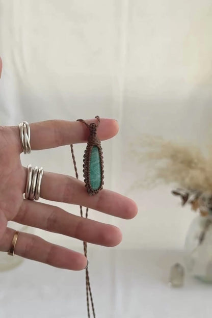Video of the handmade Amazonite Macrame necklace, highlighting the vibrant tones of the gemstone and the lightweight, minimalist macrame design.