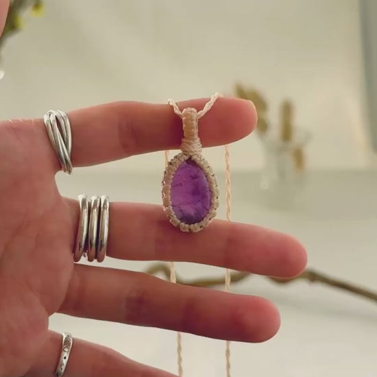Handmade Amethyst macramé necklace showing natural gemstone details, texture and shine