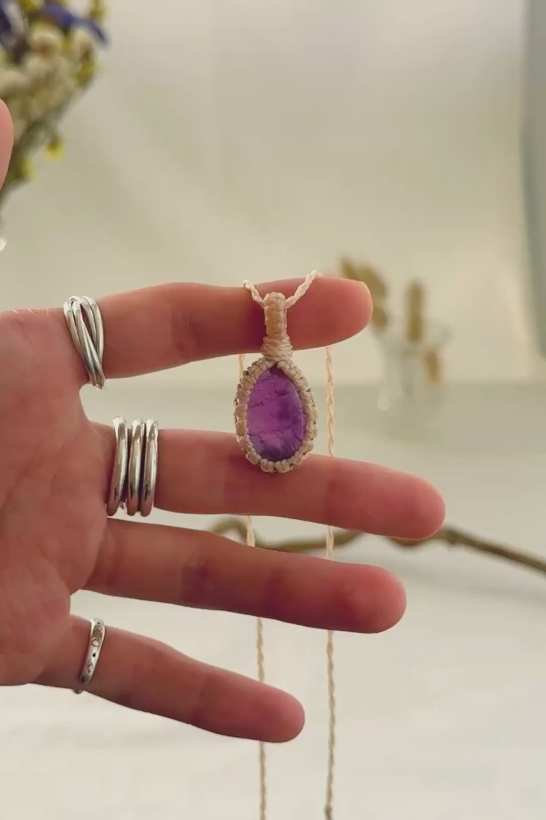 Handmade Amethyst macramé necklace showing natural gemstone details, texture and shine