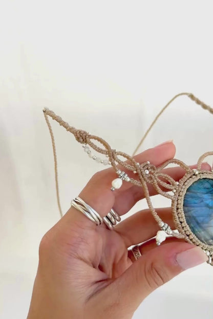 Video showing Labradorite macramé necklace with vivid blue flash, freshwater pearls, silver details, and handcrafted design.